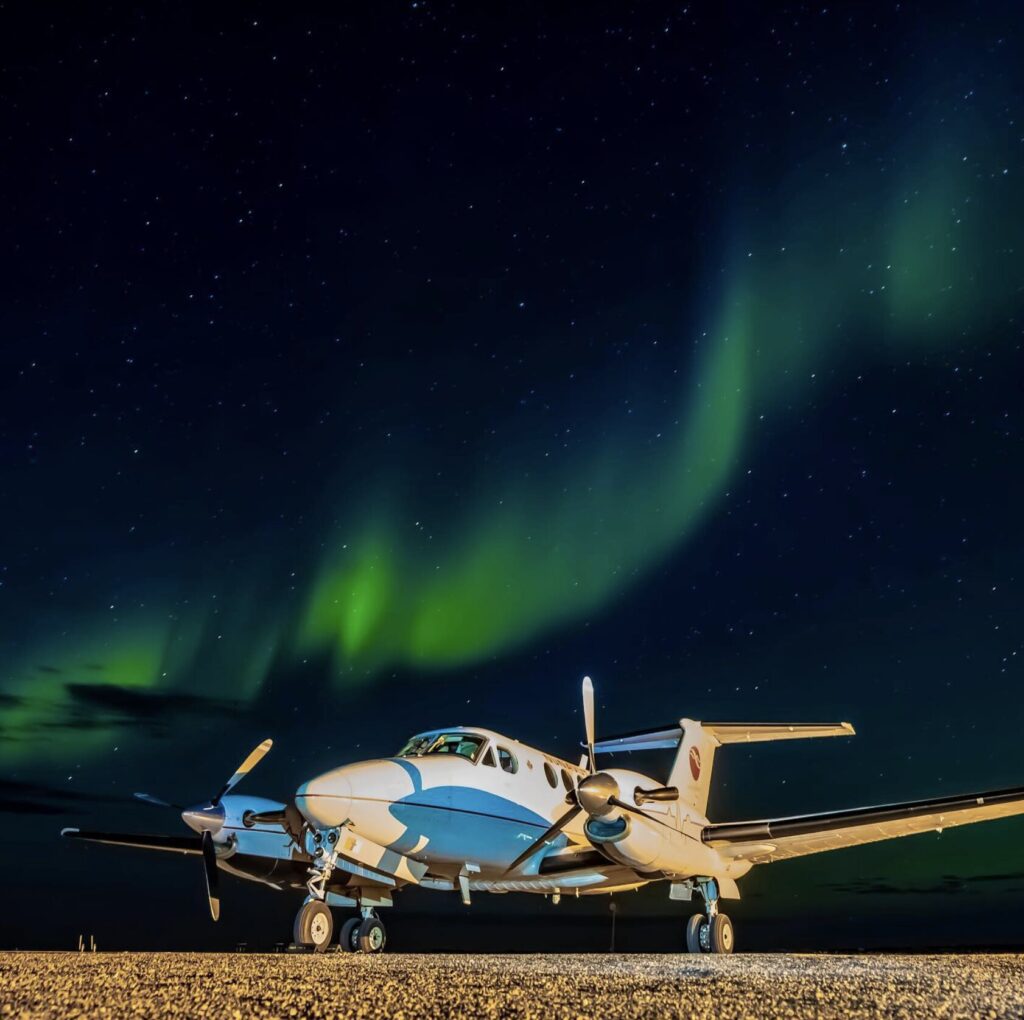 Aurora Borealis and Plane